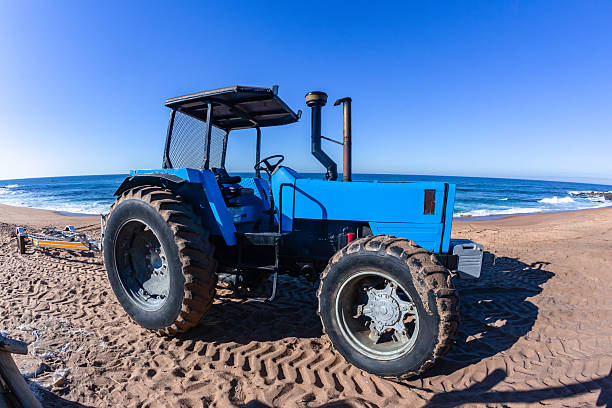 istock Beach Boat Launching Tractor Blue Ocean 2227515207