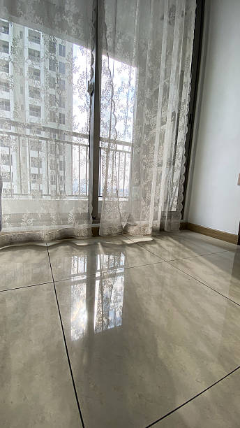 istock Shadow of transparent curtain on the floor 2227515862