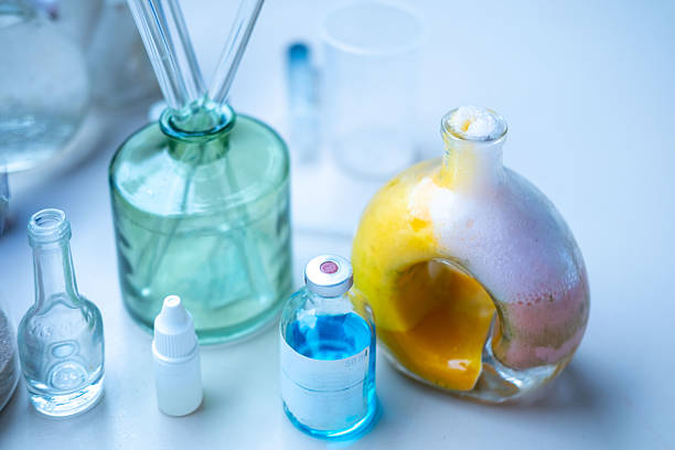 Foaming liquid demonstrating chemistry experiment, curiosity and learning practical laboratory work, Science education, scientific discovery and mixing chemical solutions