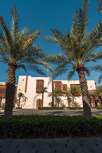 istock Traditional Arabian Architecture Between Majestic Date Palms At Jeddah Cultural Square 2227523621