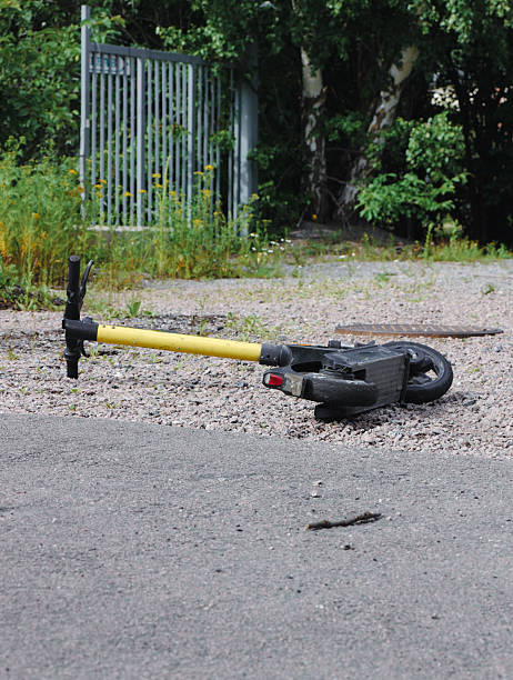istock A rental scooter discarded on the street 2227524024