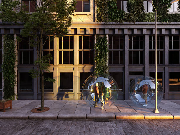 istock People inside glass spheres in the street 2227525242