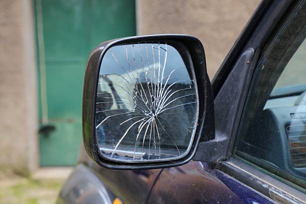 Close-up of a car's rearview mirror.