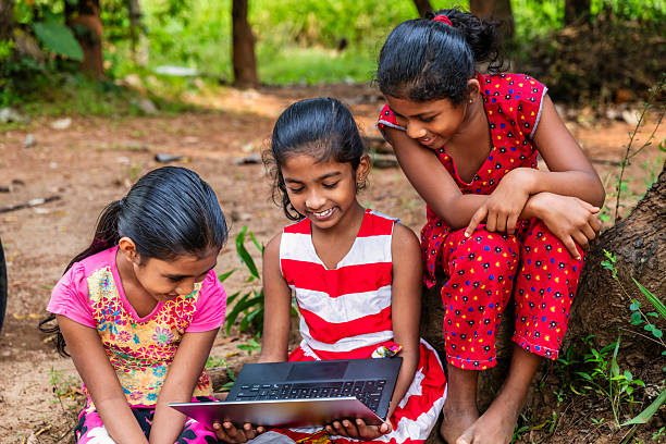 istock Sri Lankan young girls using a laptop 2227526490