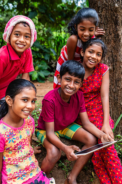 istock Sri Lankan teenagers using a digital tablet 2227526557