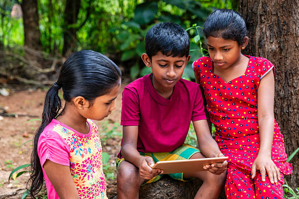 istock Sri Lankan teenagers using a digital tablet 2227526606