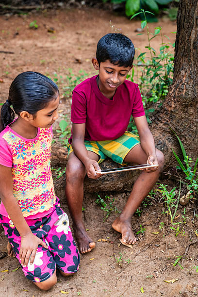 istock Sri Lankan teenagers using a digital tablet 2227526622
