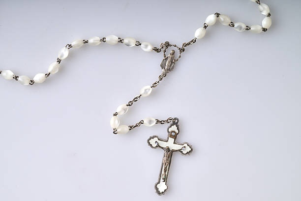 istock Symbolic antique Catholic Crucifix on white 2227542717