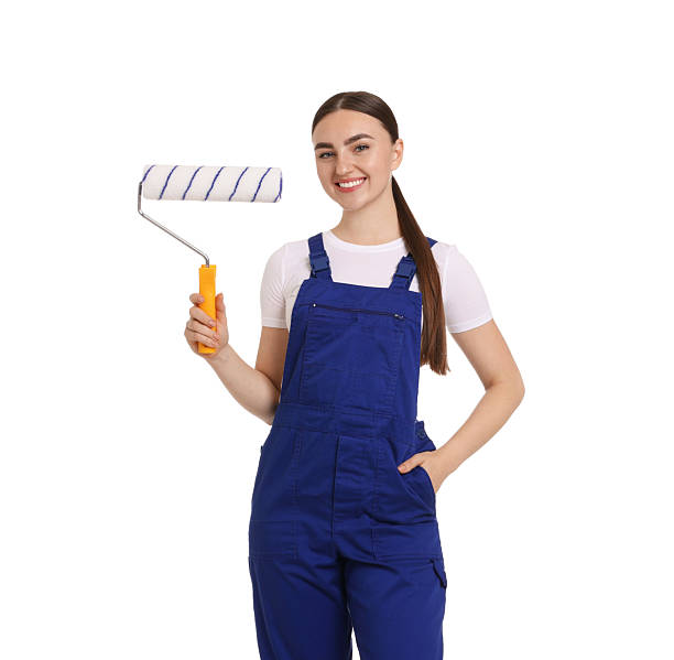 istock Portrait of young decorator with paint roller on white background 2227546460