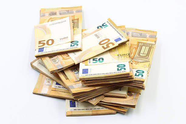 istock Stacks of 50 euro bills on a white background. 2227548191