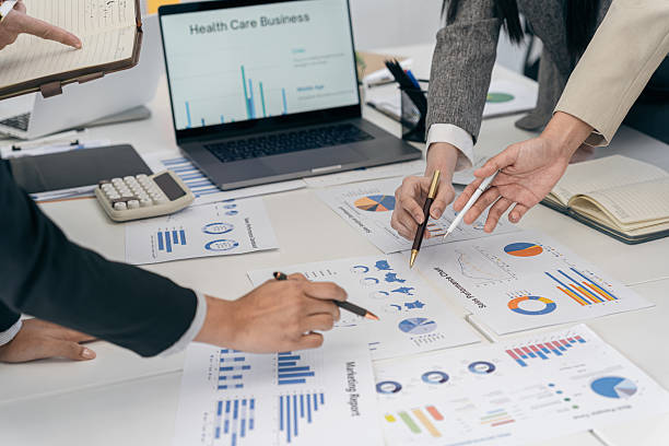 istock Business people discussing using financial document data charts and graphs. Business meeting. Financial analysis to determine business growth strategy and success. 2227549160