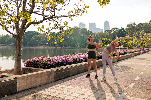 istock Two Friends Warming Up for a Morning Run 2227550397