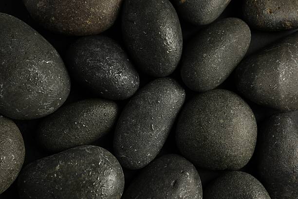 istock Wet spa stones as background, top view 2227552239