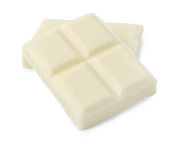 istock Pieces of delicious white chocolate isolated on white 2227552584