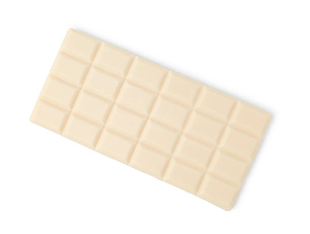istock Delicious white chocolate bar isolated on white, top view 2227552600