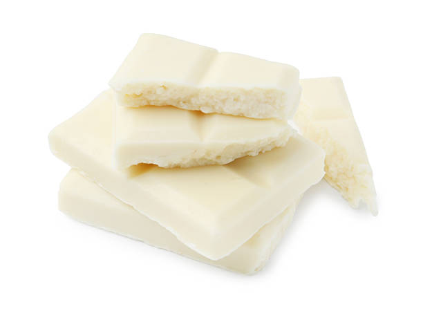 istock Pieces of delicious white chocolate isolated on white 2227552617