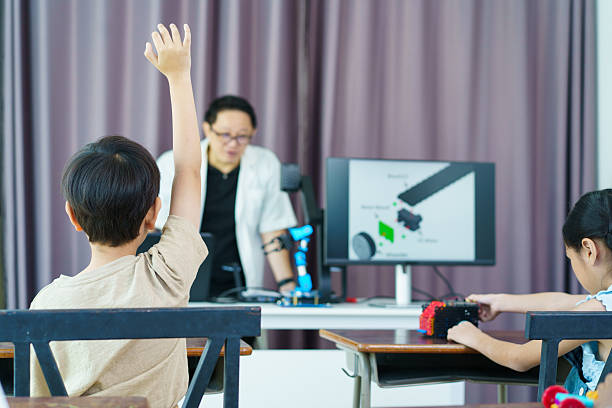A group of diverse ethnicity children are enjoy learning in STEM classroom. STEM stand for science, technology, engineering, and mathematics is help to develop learning skills and talents in children.
