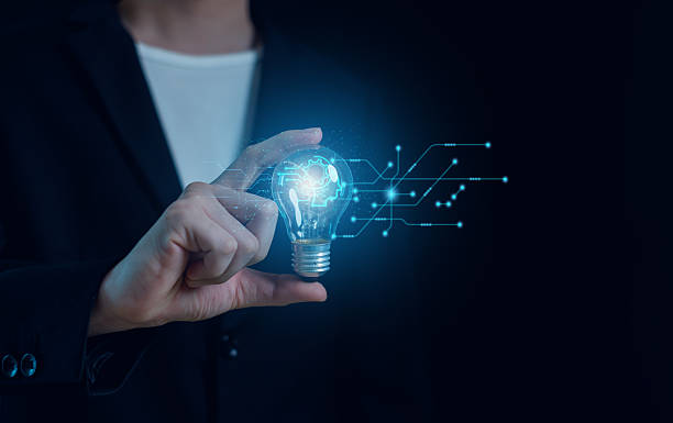 istock Hand of  holding illuminated light bulb, Idea innovation and inspiration concept.  creativity with bulbs that shine glitter, Concept for success. 2227555977