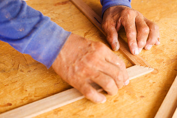 istock Close-up of carpenter's working hands 2227559197