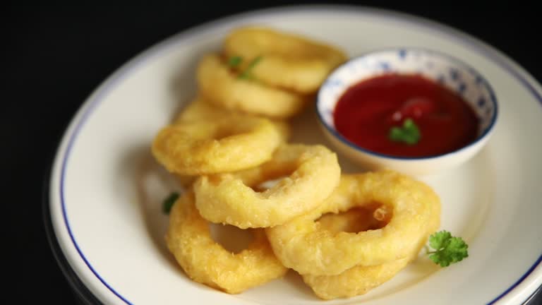 Colmar rings fried food fries fast food crispy appetizer fresh delicious gourmet food background on the table rustic food top view copy space
