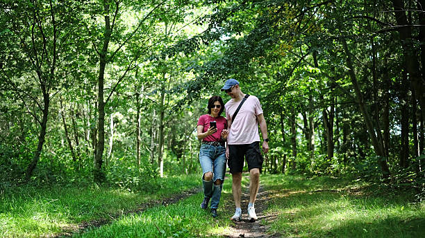 istock Young Couple Enjoys Walk 2227560373