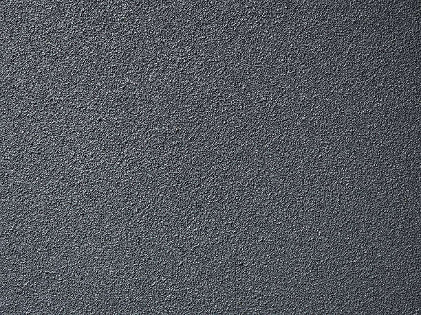 istock textured gray wall surface with rough finish, ideal for backgrounds or design elements. subtle variations in tone add depth and interest to image 2227561704
