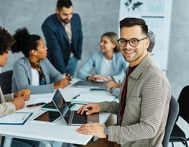 istock young business people meeting office teamwork group whiteboard presentation seminar man businesswoman startup creative training portrait 2227561987
