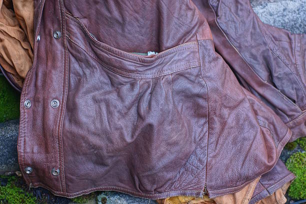 istock part of an old brown wrinkled leather jacket 2227562710