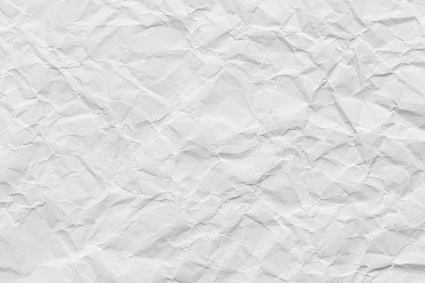 istock Macro white crumpled paper background,White crumpled paper background, texture old for web design screensavers. Template for various purposes or creating packaging. 2227564032