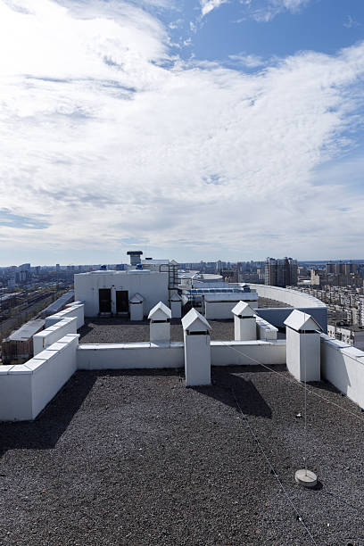 istock Stunning View from Rooftop: A Wide Angle Urban Landscape Underneath Beautiful Cloudy Sky Over Cityscape and Buildings Captured in Daylight 2227564981