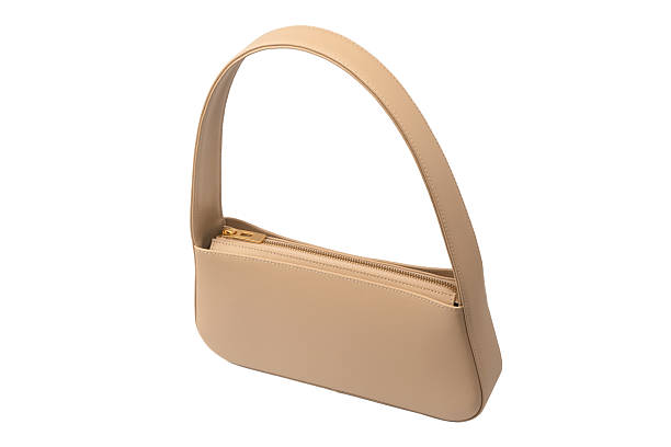 istock Beige women leather bag isolated on white background. 2227565999