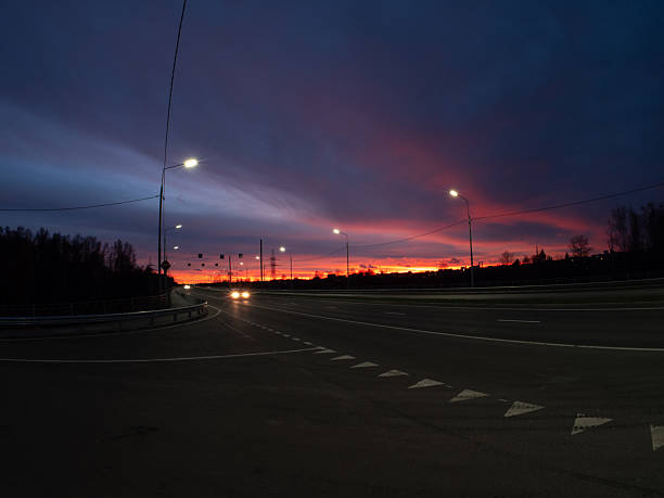 Colorful summer sunset over the highway