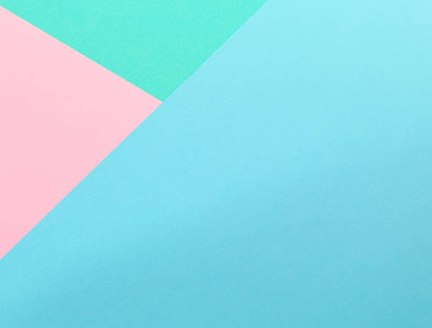 istock Multicolored triangle. Blue, pink and green colors paper background. 2227568061