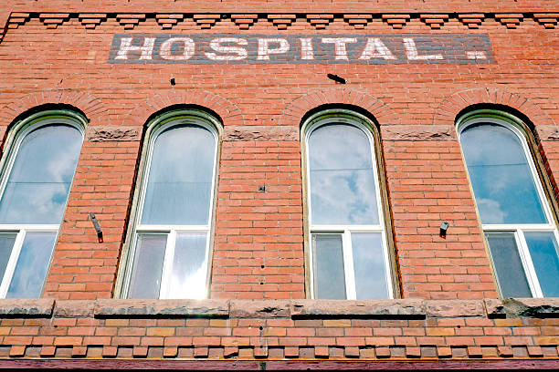 istock Old Red Brick Hospital Building in Old Town 2227570324