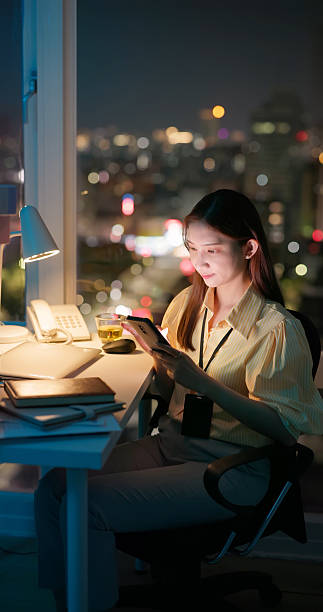 istock business woman using mobile phone check information 2227572560
