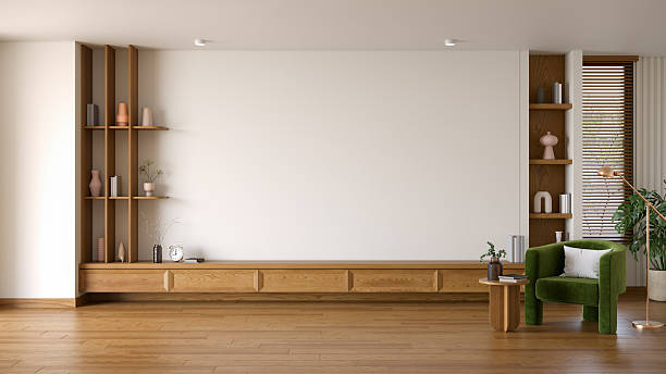 istock Living room  interior tv wall idea ,has a window providing natural light. There are also white walls and modern sofas with wooden cabinet that give it a warm feel .3d render 2227576697