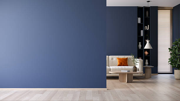 istock dark blue walls mock up ,have a window providing natural light.  modern sofas that give it a warm and comfortable feel.3d render 2227576729