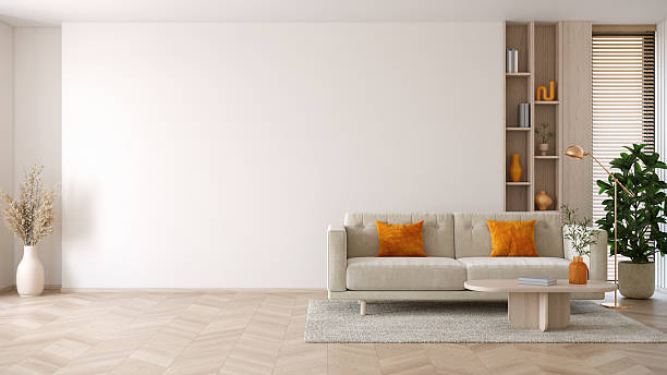 istock modern living room have a window providing natural light. and white walls and modern sofas  with plant that give it a warm and comfortable feel.3d render 2227576745