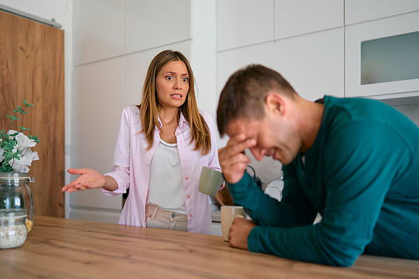 istock Young couple arguing in the kitchen having relationship difficulties 2227594913