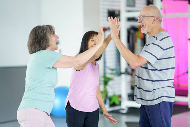 istock Active Seniors Engaging in Group Exercise and Celebrating Together 2227595244