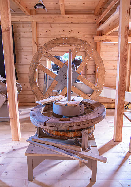 istock Traditional Wooden Millstone in Rustic Interior 2227596169