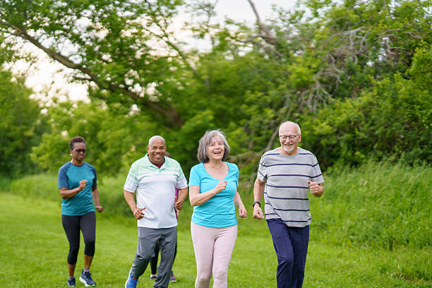 istock Senior Friends Enjoy Exercise Together in a Park Setting 2227596271