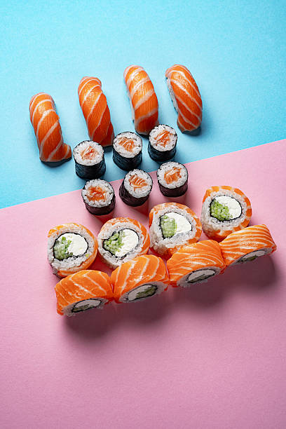 istock Assorted Sushi Rolls and Nigiri on Pastel Background 2227596701