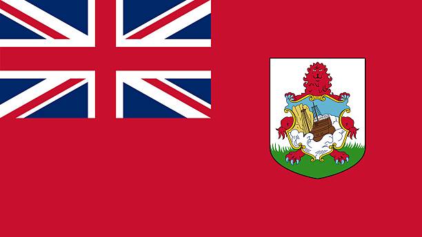 istock Bermuda's national flag waving proudly against a clear blue sky 2227600412