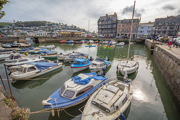 Boats floating in Dartmouth Harbour, Devon, England, UK