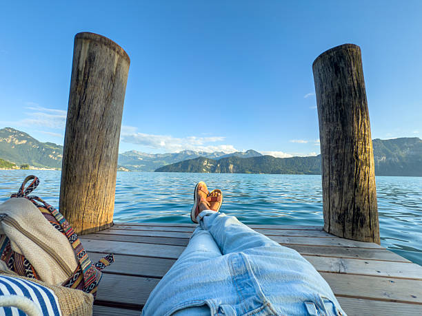Wooden pier overlooking the Alps and Lake Geneva in Switzerland