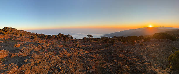 istock Sun is setting behind the mountain Meru, tanzania 2227604415