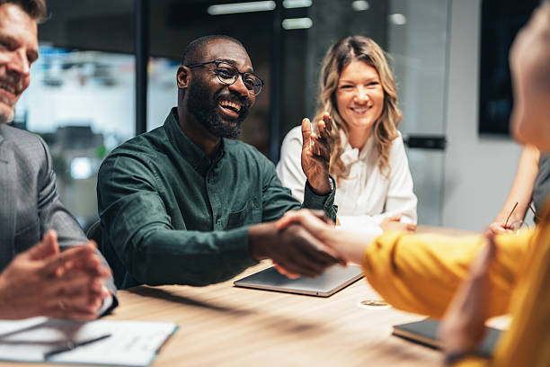 istock Successful business agreement sealed with a handshake in modern office 2227605972