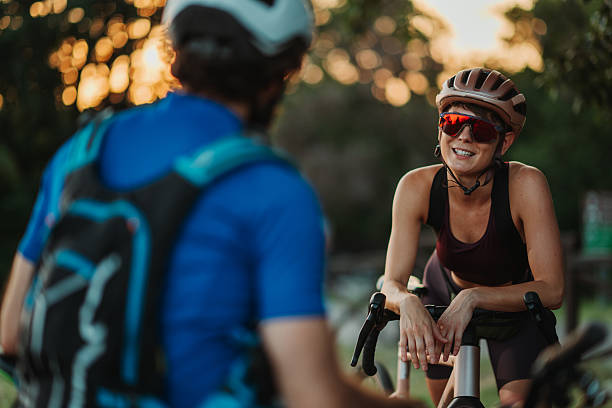 istock Cyclists taking a break and chatting during a ride at sunset 2227606753