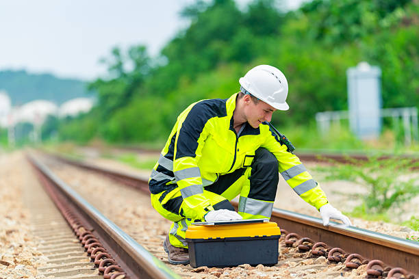 istock Male engineer maintain railroad track. 2227613454